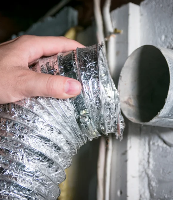 Person installing Dryer vent